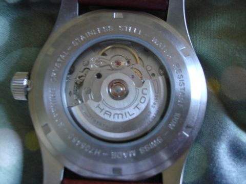 1994 Ford Bronco - Close-up of a Hamilton watch's automatic movement, viewed through the transparent case back.