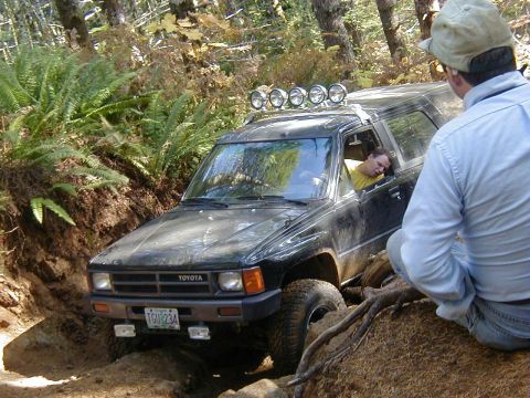1994 Ford Explorer - This Toyota 4Runner is tackling a challenging off-road course, with the driver taking a nap.