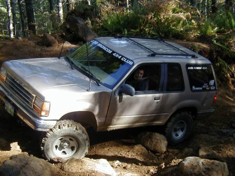 1994 Ford Explorer - This 1994 Ford Explorer navigates a challenging off-road course with large tires and a lifted suspension.