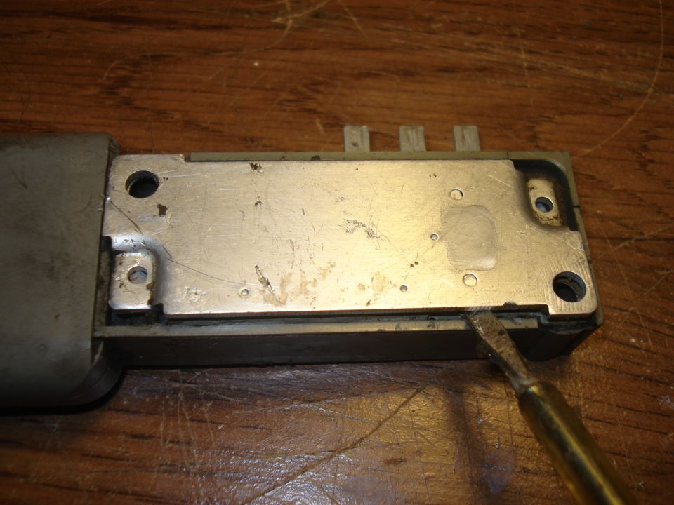 All the electronic is covered by a sticky stuff, very difficult to remove. After trying to remove the sticky sh&@#t  with screw driver, pliers, etc. I decided to remove the back plate