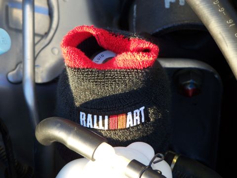 1995 Ford Probe - Close-up of a Ralliart branded engine component cover.