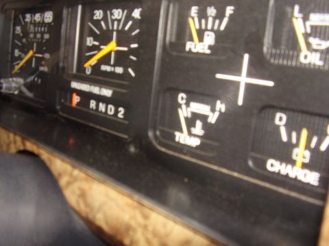 1986 Ford Bronco - Dashboard gauges including fuel, temperature, oil, and charge indicators are visible in this 1986 Ford Bronco.