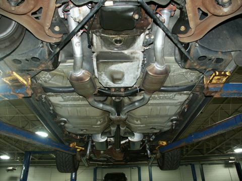 2001 Mercury Grand Marquis - Underbody view of a 2001 Mercury Grand Marquis, highlighting the dual exhaust system.