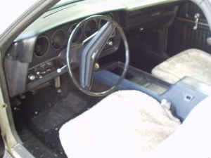 1973 Ford Ranchero - The interior of a car is shown, with a Supermotors logo at the bottom right.