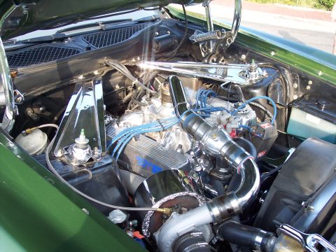 1973 Ford Mustang - Customized engine bay a turbocharger and aftermarket components.