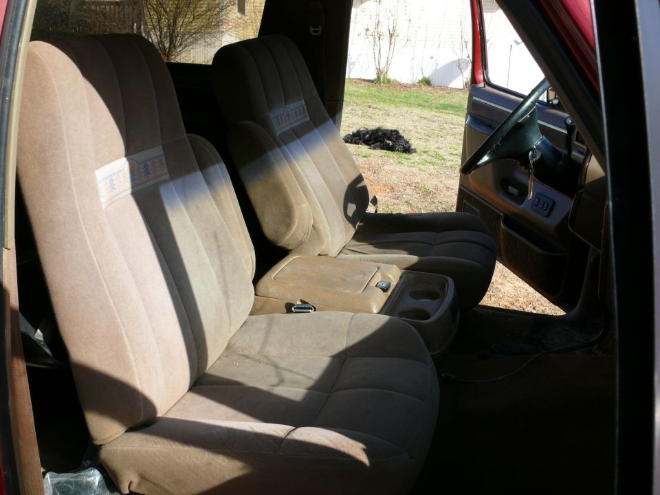 1988 Ford Bronco interior showing front bucket seats and center console
