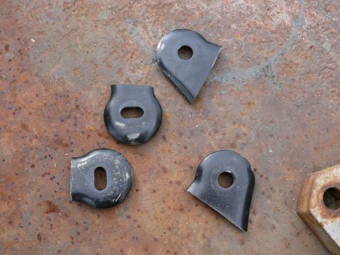 1988 Ford Bronco - These metal brackets are for sale, possibly for a vehicle seat upgrade.