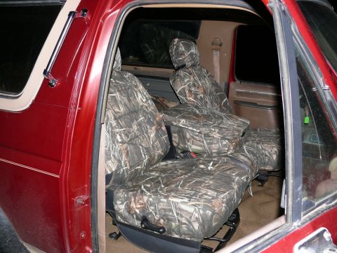 1988 Ford Bronco - This 1988 Ford Bronco features camouflage seat covers over its interior seating.
