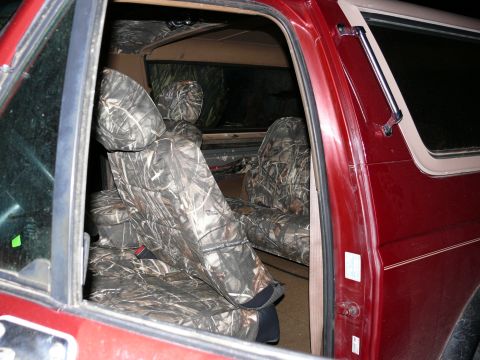 1988 Ford Bronco - Interior view of a 1988 Ford Bronco, camouflage seat covers.