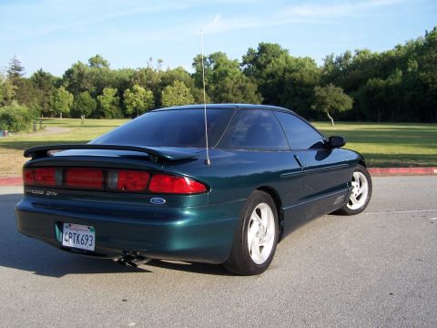 1996 Ford Probe - This 1996 Ford Probe is captured from a rear three-quarter view, its distinctive spoiler and custom license plate.