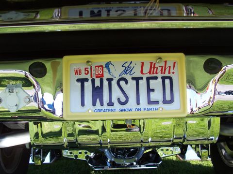 1973 Ford Mustang - Close-up of a vehicle's rear bumper and a custom Utah license plate.