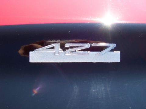 1973 Ford Mustang - A close-up shows a "427" badge on the side of a vehicle.