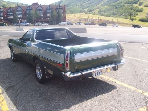 1972 Ford Ranchero - The rear of a green 1972 Ford Ranchero GT shows its distinctive tailgate and GT badging.