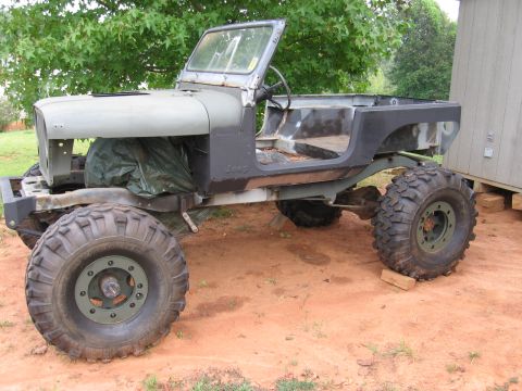 1980 Jeep CJ7 - This Jeep CJ appears to be in a state of disassembly, with its body and chassis exposed.