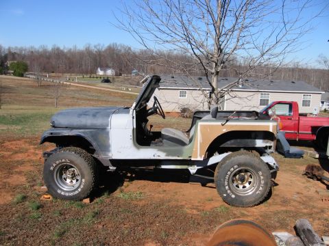 1980 Jeep CJ7 - This 1980 Jeep CJ7 is in the process of being restored, with its bodywork showing signs of preparation for a new paint job.