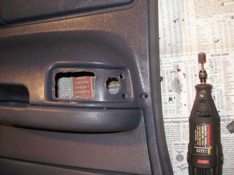2001 Ford Crown Victoria - A Dremel then removed the rest of the area needed to fit the lense and bulb housing.