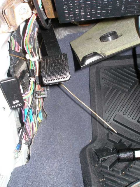 2001 Ford Crown Victoria - Use a hanger to snake the wiring back throw the rubber "tunnel" between the door and body.