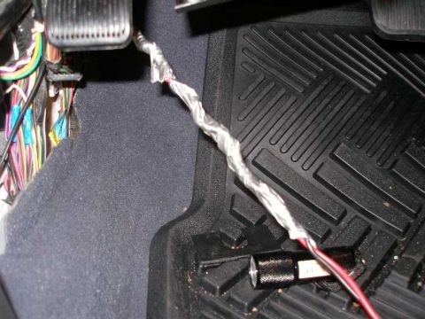 2001 Ford Crown Victoria - Wrap the wires around the coathanger and cover the wiring with duct tape to secure them in place during their "journey".