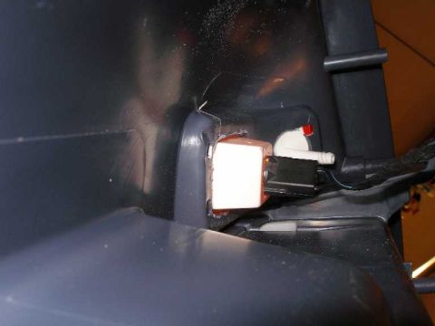 2001 Ford Crown Victoria - Close-up of a vehicle's interior door courtesy lamp assembly.