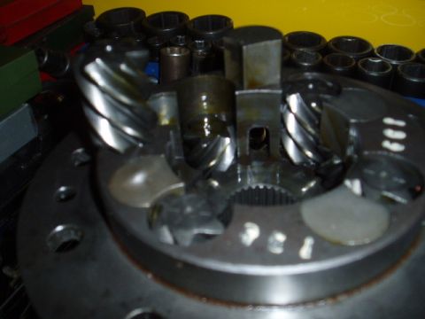 1980 Ford Bronco - Close-up view of differential gears, showing internal components and some visible markings.