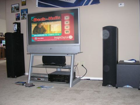 1996 Ford Bronco - Home theater setup with a large television, speakers, and audio-visual equipment.