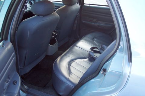 2001 Ford Crown Victoria - Interior view of the back seat area of a 2001 Ford Crown Victoria.