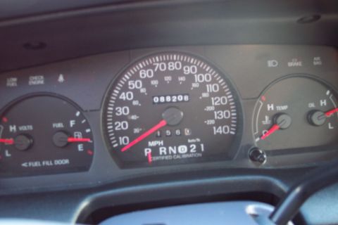 2001 Ford Crown Victoria - Dashboard view of a 2001 Ford Crown Victoria, showing odometer and gear selector.