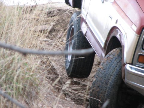1986 Ford Bronco - This 1986 Ford Bronco navigates a challenging off-road trail, its capabilities.