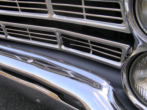 1967 Ford Galaxie - Close-up of the distinctive chrome grille and bumper of a 1967 Ford Galaxie.