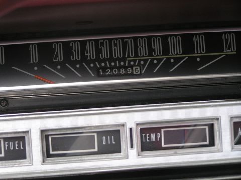 1967 Ford Galaxie - Interior view of a car's dashboard, displaying various gauges and an odometer reading.
