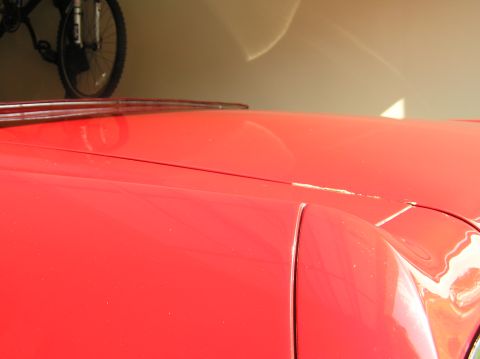 1967 Ford Galaxie - Detail of a 1967 Ford Galaxie hood, showing the body lines and chrome trim.