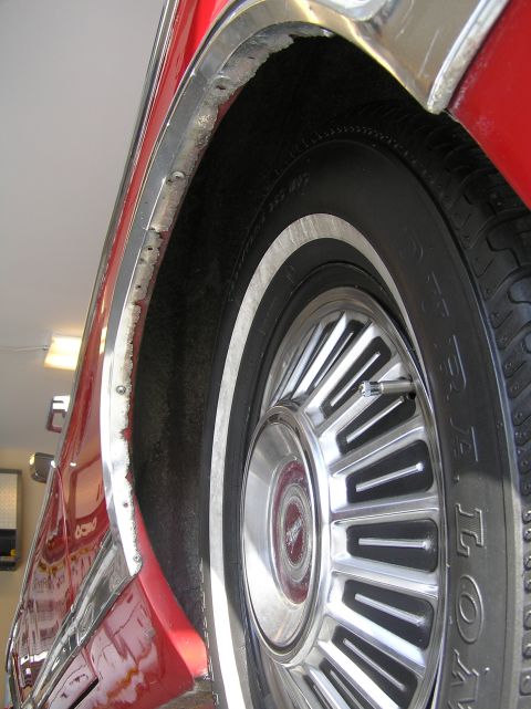 1967 Ford Galaxie - Rear wheel well trim could use replacing.