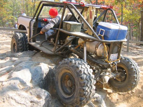 1992 Ford Mustang - Custom off-road buggy tackles a challenging rocky trail during an outdoor adventure.