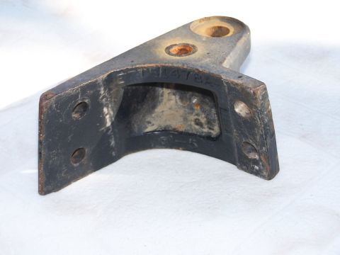 1990 Ford Bronco - Close-up of a metal bracket, possibly a vehicle part, with the stamped number E7TA 1478A visible.