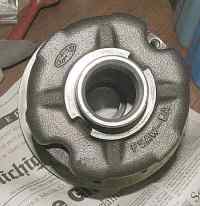 1996 Ford Bronco - A close-up view of a cast metal Ford component, possibly a pulley or hub, with visible text and branding.