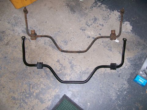 1995 Mercury Grand Marquis - Comparison of a rusty old sway bar and a new replacement sway bar.