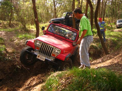 2001 Jeep Wrangler - Off-roaders tackle a challenging trail in their Jeeps.