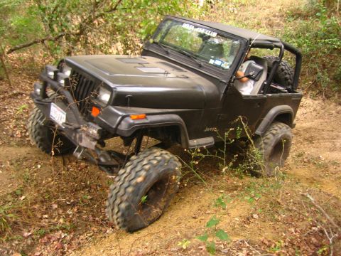 2001 Jeep Wrangler - This Jeep Wrangler appears to be from the YJ generation, which ran from 1986 to 1995, not a 2001 model.