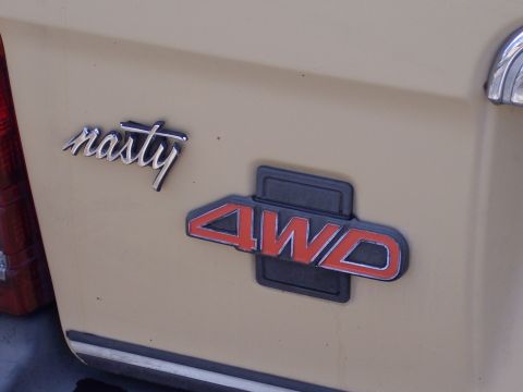 1972 Ford Ranchero - Vehicle exterior shows 'nasty' and '4WD' emblems.