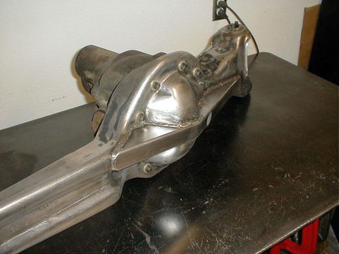 1996 Ford Bronco - A close-up view of a modified rear axle assembly, likely for a vehicle restoration or custom build.