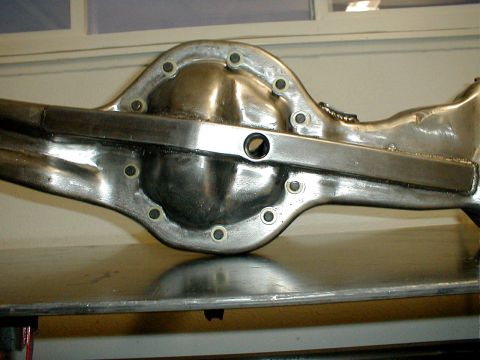 1996 Ford Bronco - Close-up view of a differential housing, a component of a vehicle's drivetrain.
