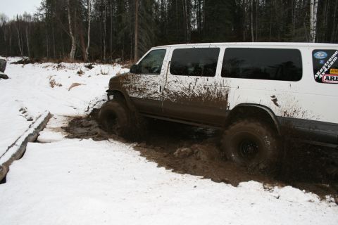 2003 Jeep TJ - Van navigates a challenging muddy and snowy off-road course.