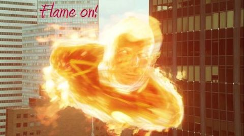 2006 Ford E350 - The Human Torch is shown in action against a backdrop of city skyscrapers, with the phrase 'Flame on!' visible.