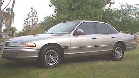 1994 Ford Crown Victoria - This sedan's body style suggests it is a 1995 model, not a 1994.