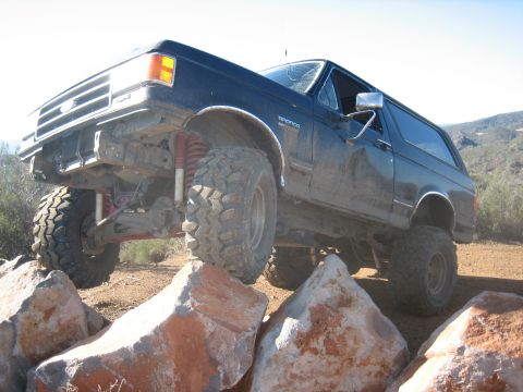 1995 Ford Bronco - This lifted 1995 Ford Bronco navigates a rocky obstacle course.