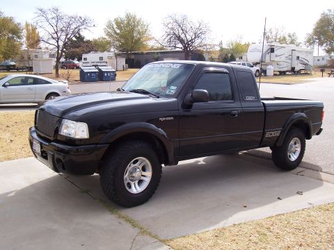 2003 Ford Ranger - This black 2003 Ford Ranger Edge pickup truck is shown from a 3q-front angle, parked on a paved surface.