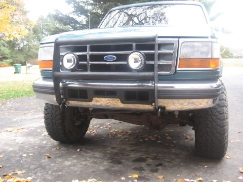 1996 Ford Bronco - Front view of a 1996 Ford Bronco, equipped with a brush guard and fog lights.