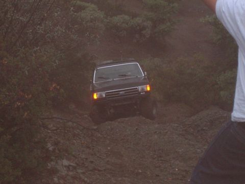 1989 Ford Bronco - This 1989 Ford Bronco navigates a challenging off-road trail.