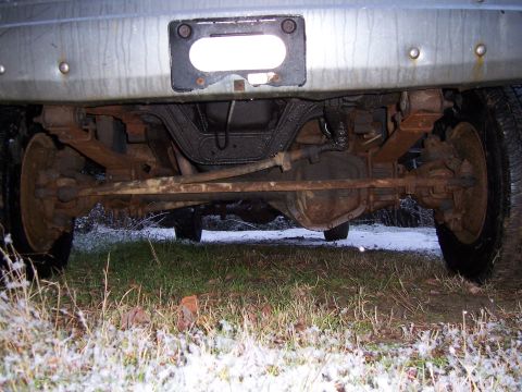 1996 Ford Bronco - The rear suspension and axle assembly of a heavy-duty truck are shown in this underside view.