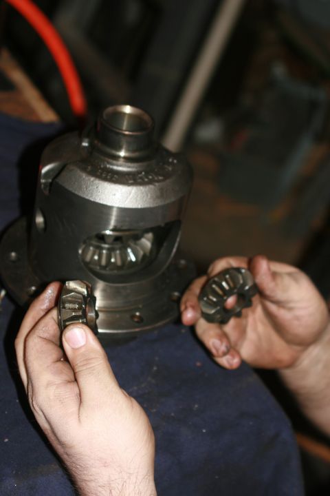 1990 Ford Bronco - Here are the spiders removed from the case. Note that with the spiders removed one of the side gears falls down.